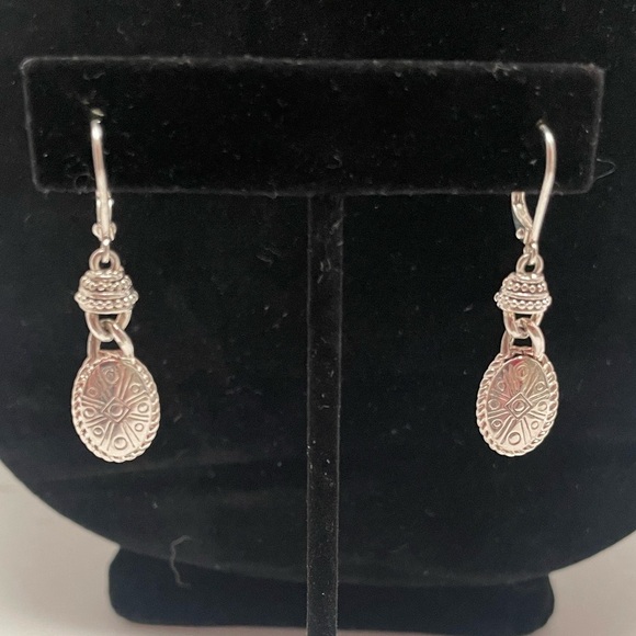 Gorgeous silver tone dangle earrings with a southwestern flair. Two pair - Picture 1 of 8